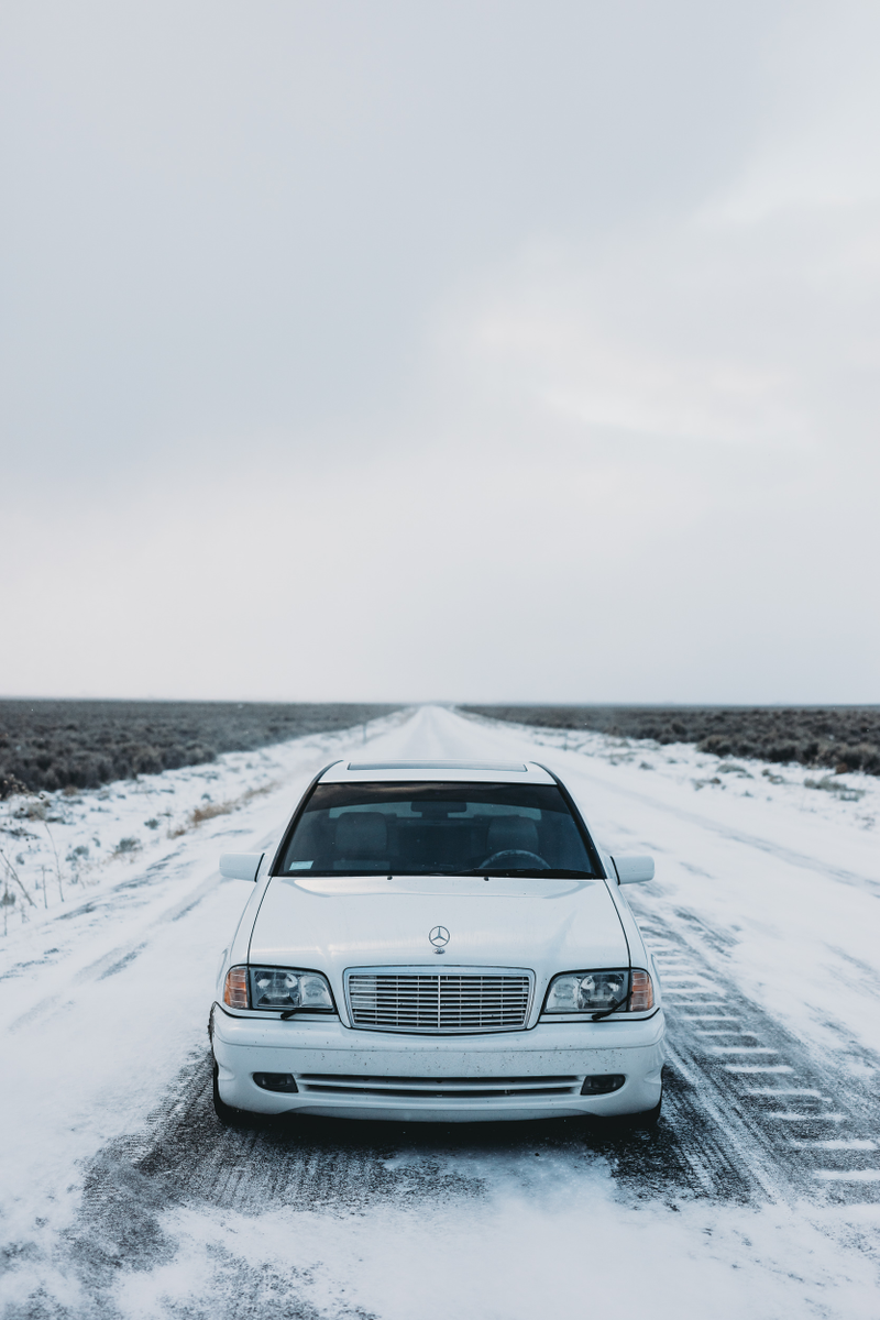 Illustration for article titled The Cautionary Tale of an Idiot, a Mercedes C43 AMG, Bald Tires and 2,000 Miles of Blizzard